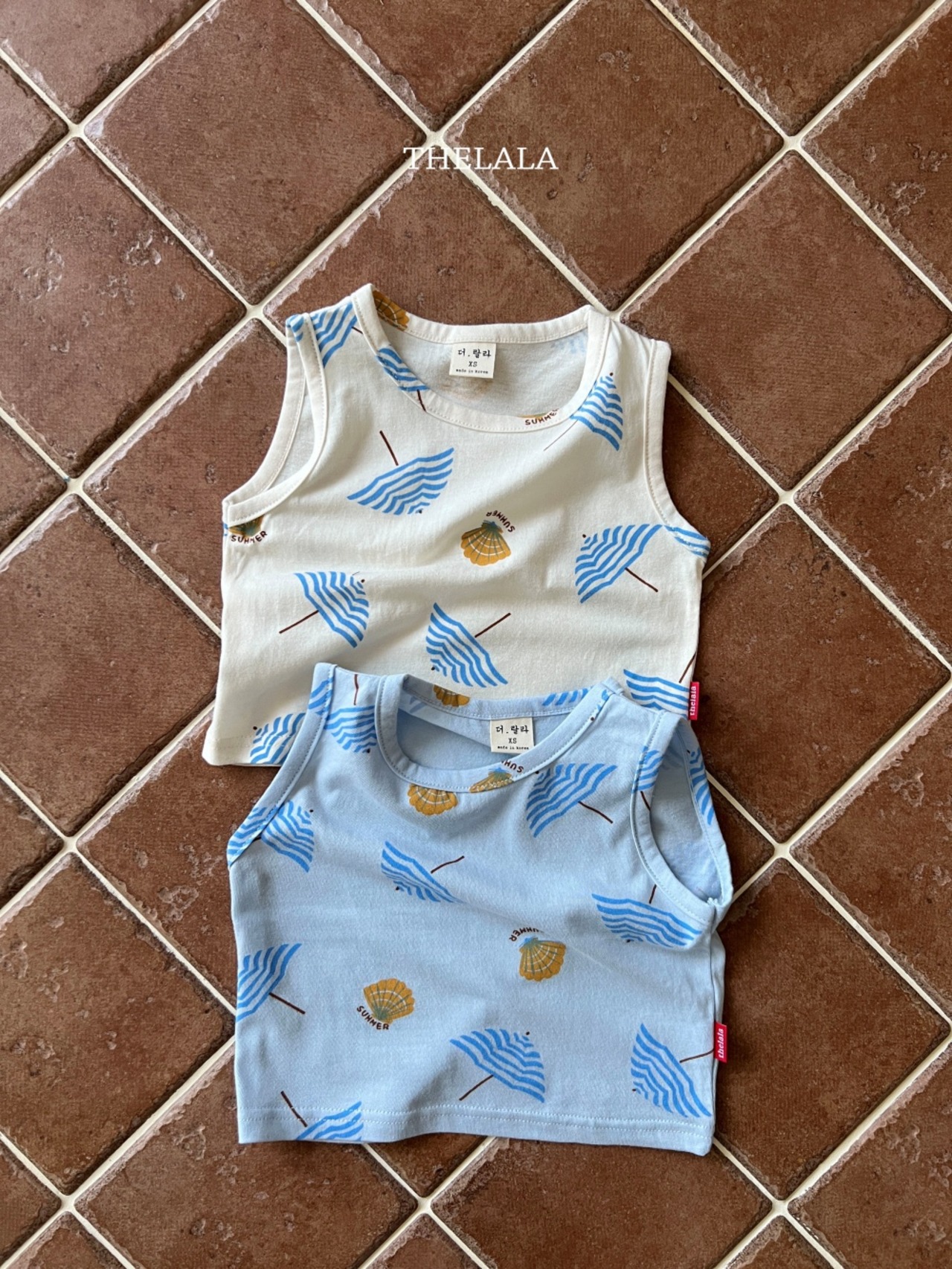 [THELALA] Parasol Sleeveless / [더랄라] 파라솔나시