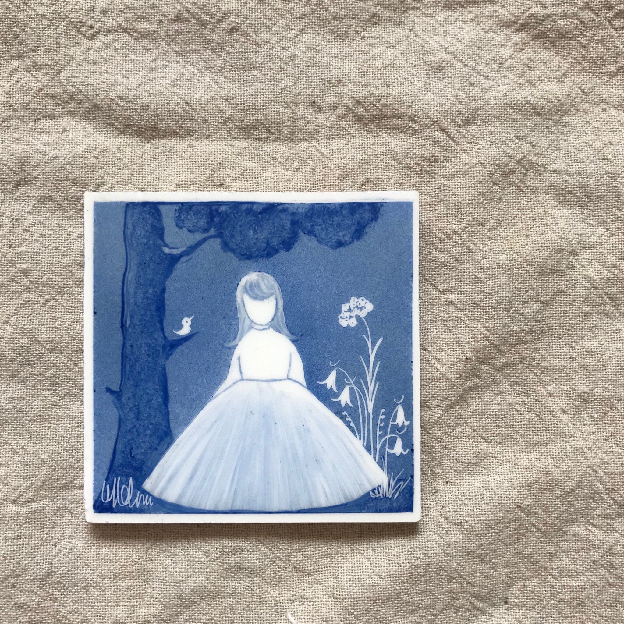 青い女の子のタイル