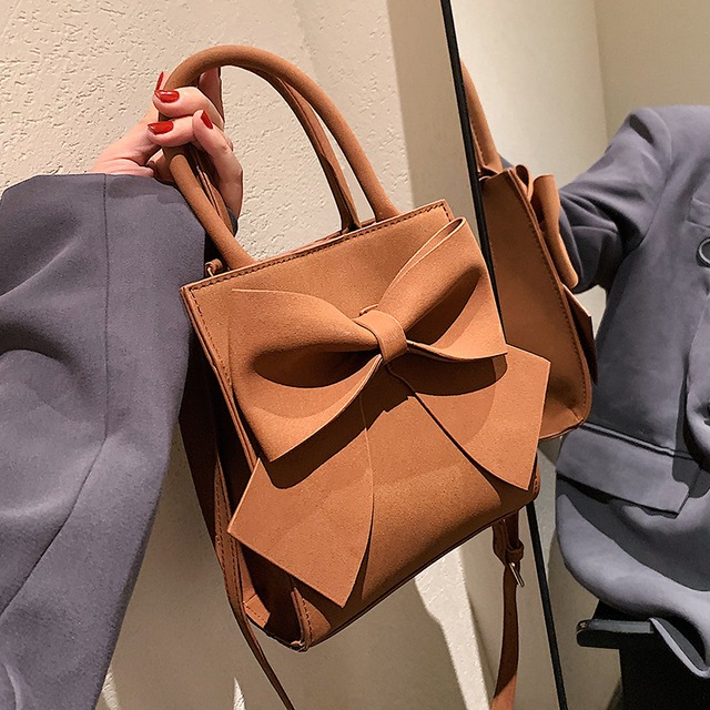 オータムウィンタースタンダードリボン レトロ 秋物 冬物 メッセンジャーバッグ Tiancai_Wing_Bag21064054111