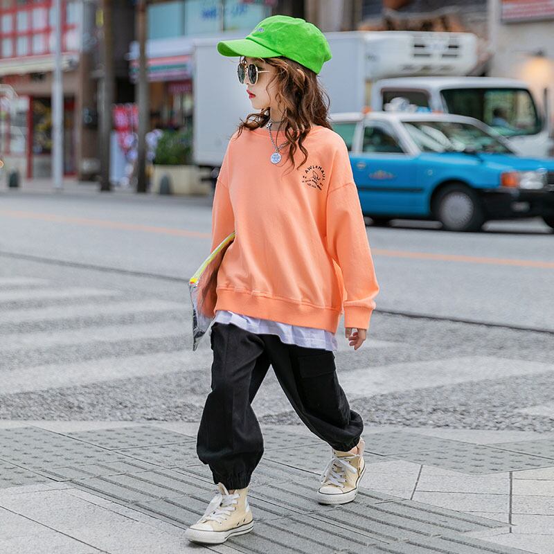 ガールズセーター2021年春秋バージョンのエインスタイルの子供用ビッグチルドレンの秋の服は、偽のツーピースネットレッド長袖トップスです。 トレンディボーイ96033955587