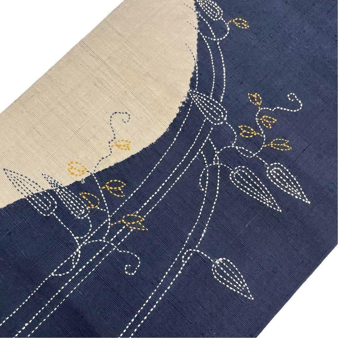 名古屋帯 作家物 刺し子 花草模様 紬 染分け 紺鉄色 O-3659 | リユース  