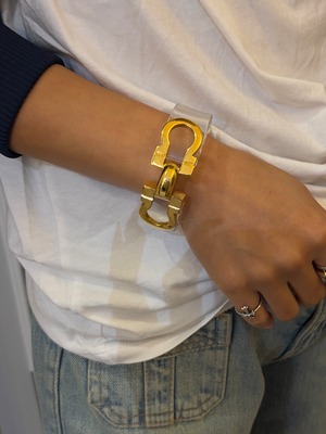 Salvatore Ferragamo/ vintage Gancini clear gold bangle.(o)