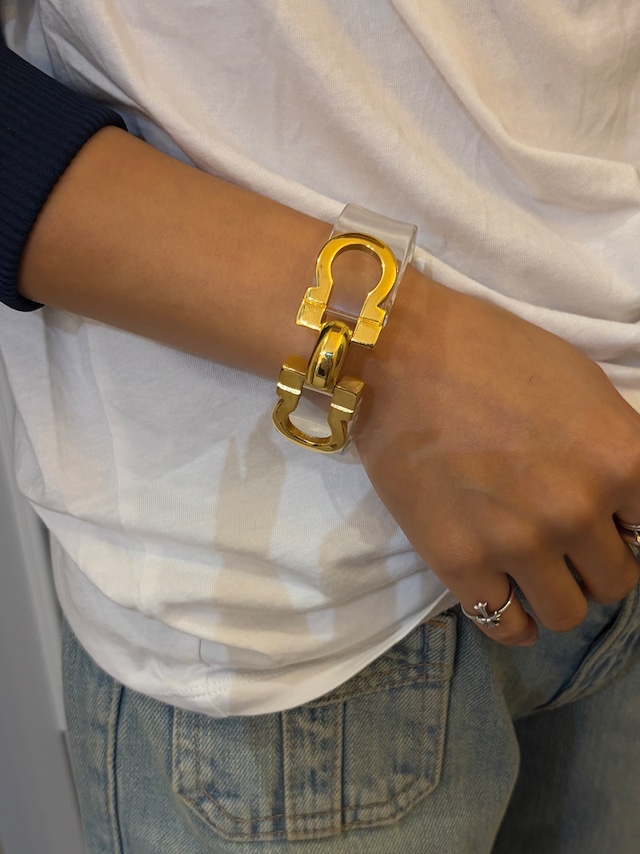 Salvatore Ferragamo/ vintage Gancini clear gold bangle.(o)