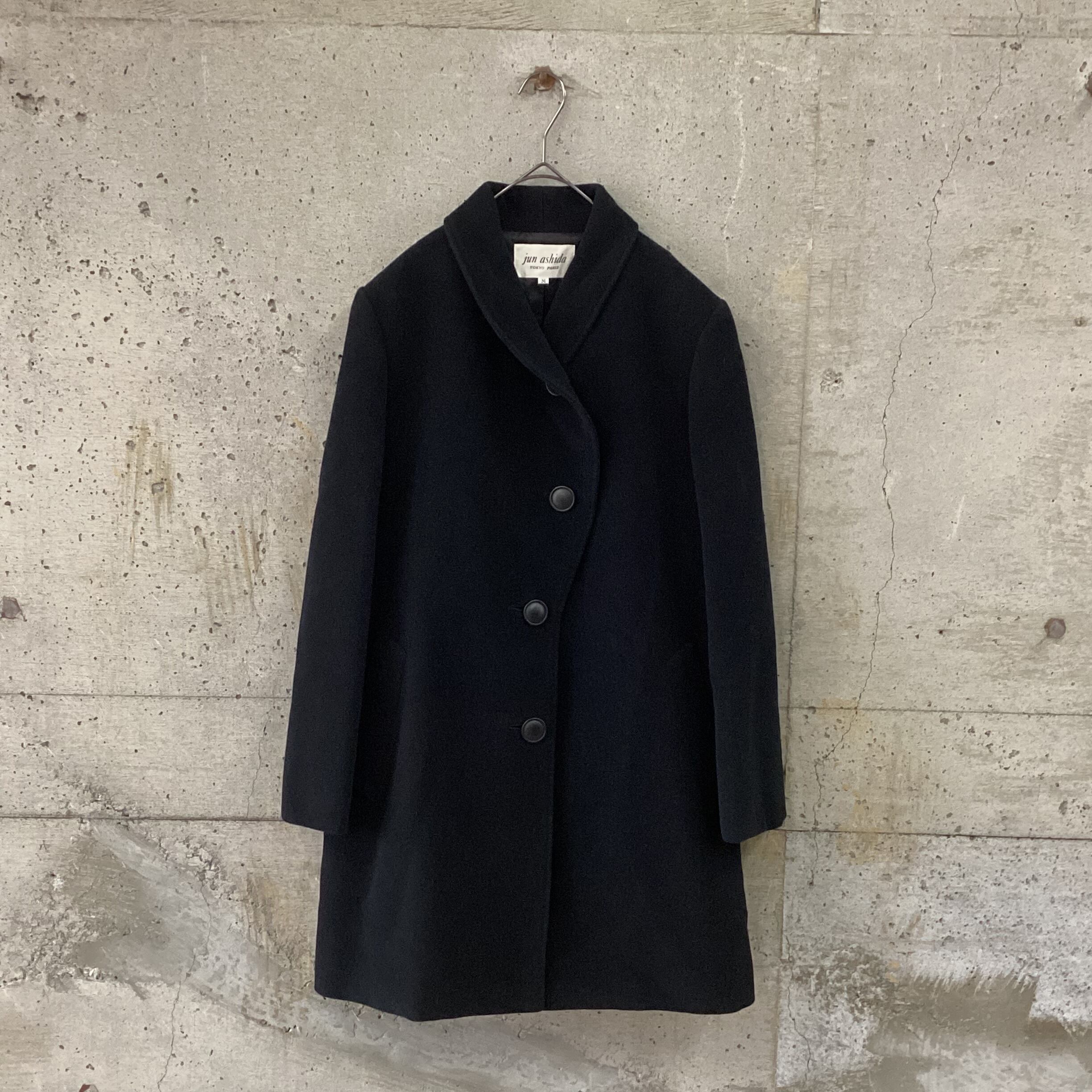 Black coat with curved front