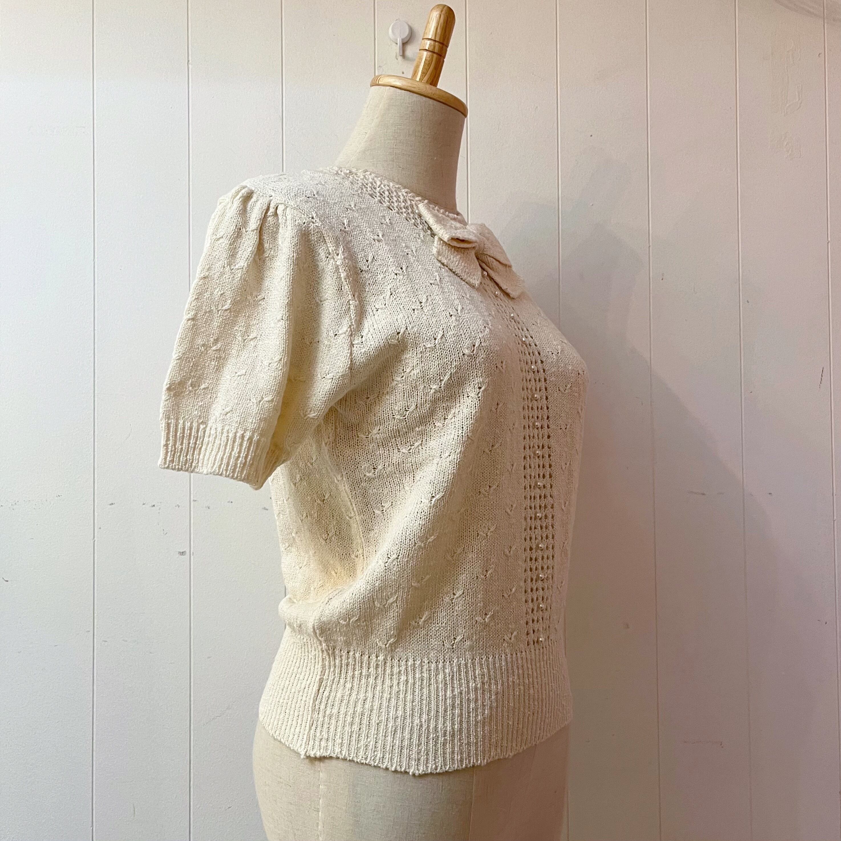 ribbon brooch off white knit po