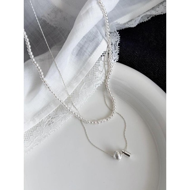 baby pearl & metal charm layered necklace