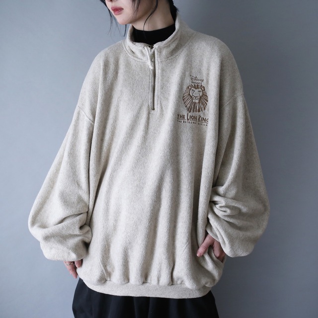 front embroidery side and pocket zip design over wide silhouette half-zip wool pullover