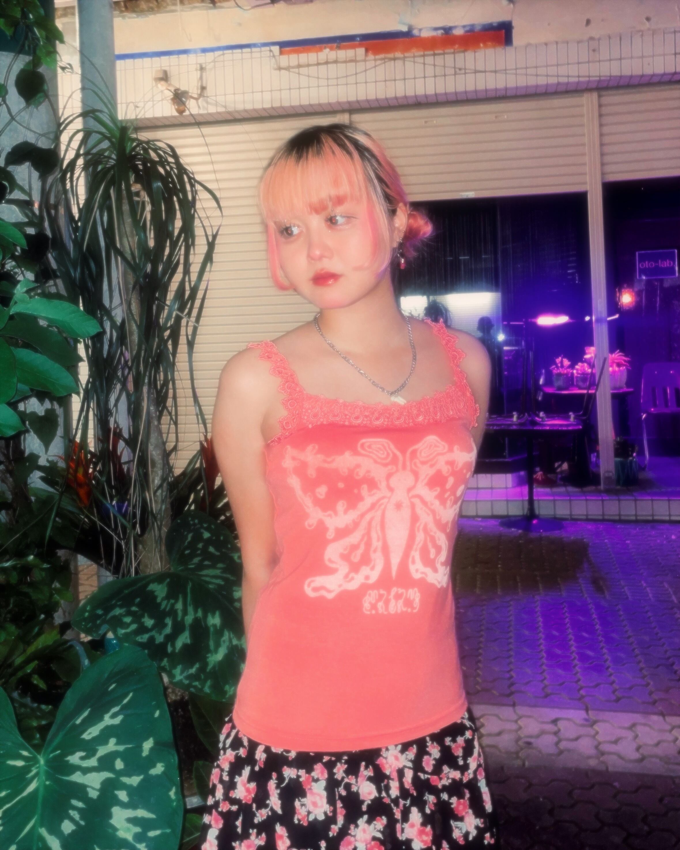 The world behind butterfly camisole