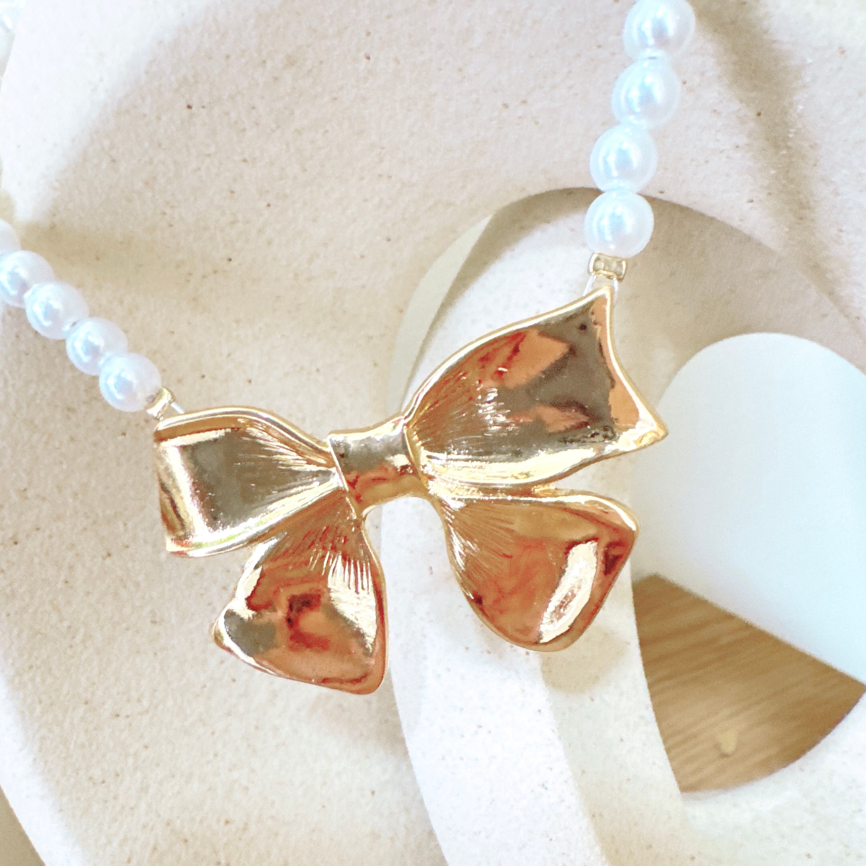 大きなゴールドリボンネックレス