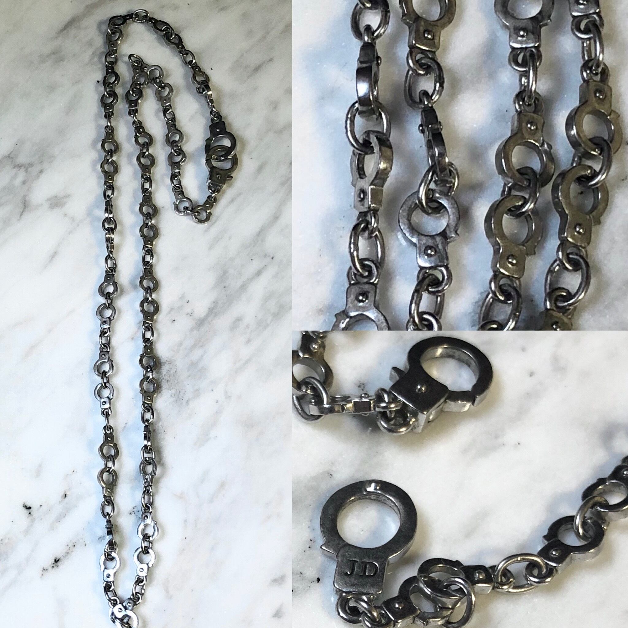 JUSTIN DAVIS handcuffs motif silver necklace | NOIR ONLINE