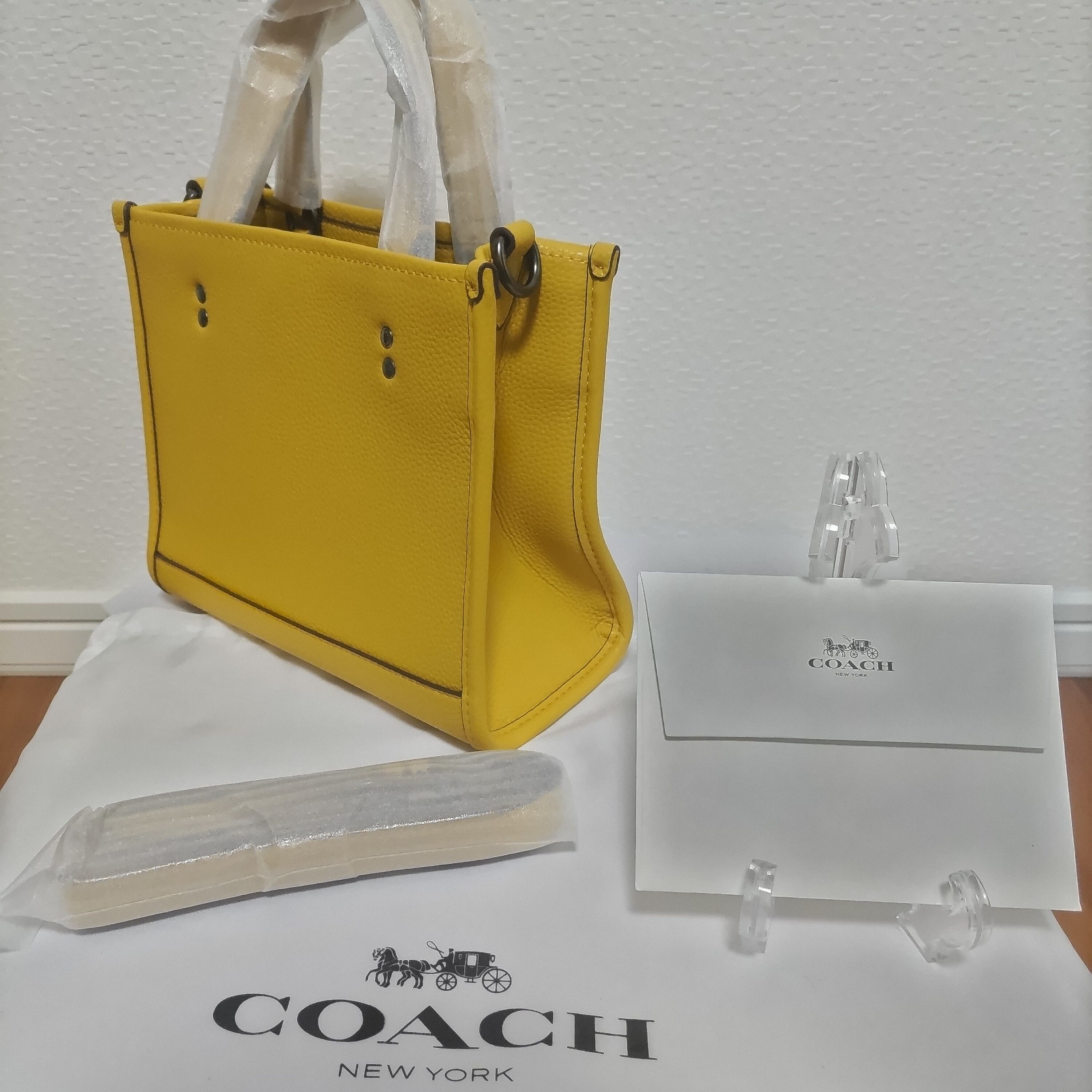 COACH コーチ スヌーピー コラボ トートバッグ デンプシートート 新作