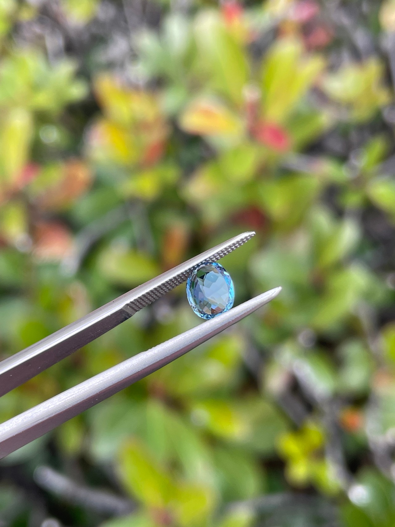 タトゥーアクアマリン ①6.5x5.2mm, 0.70ct - ブラジル産