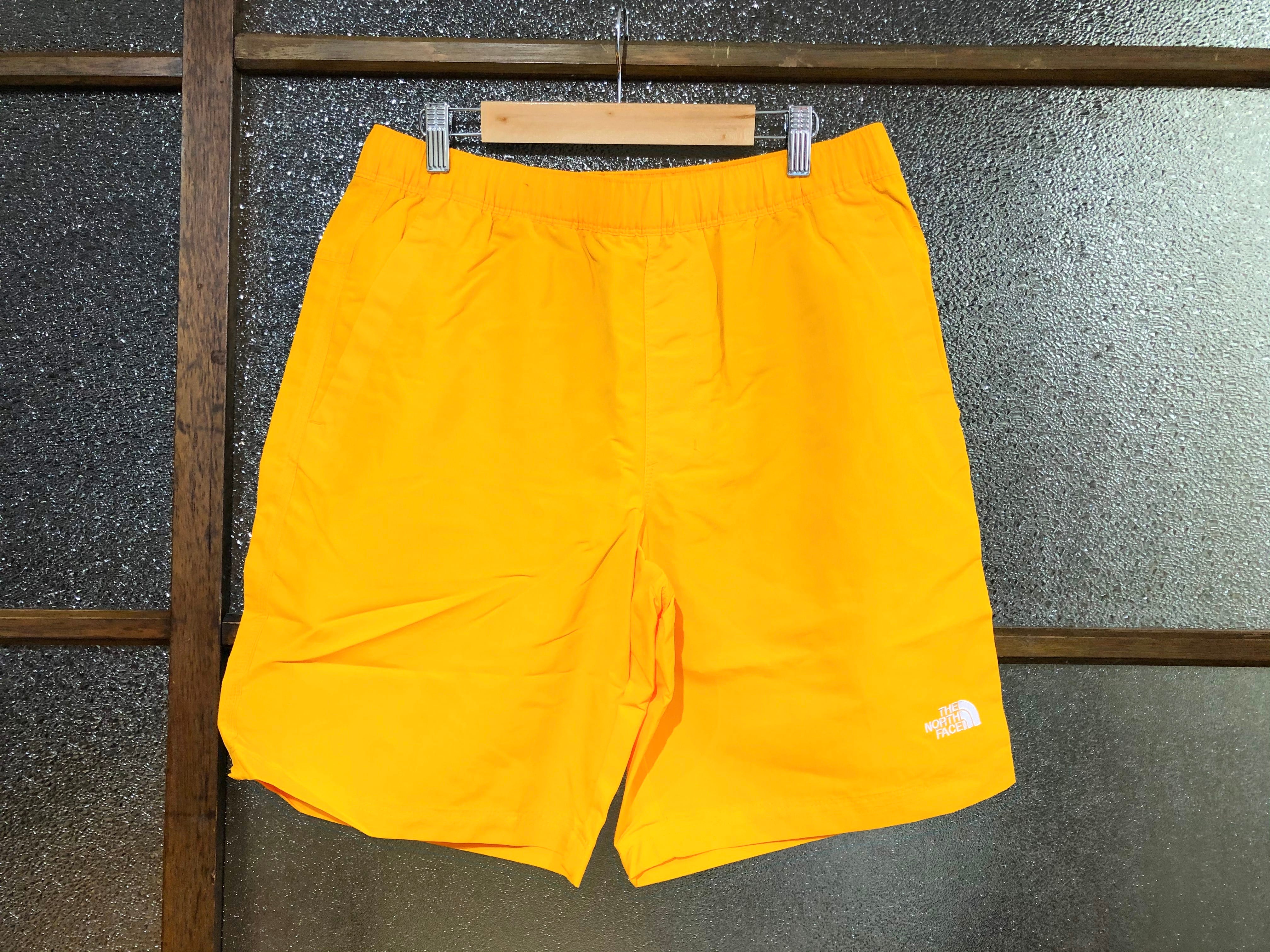 THE NORTH FACE CLASS V RAPIDS SHORT PANTS (ZINNIA ORANGE) | 