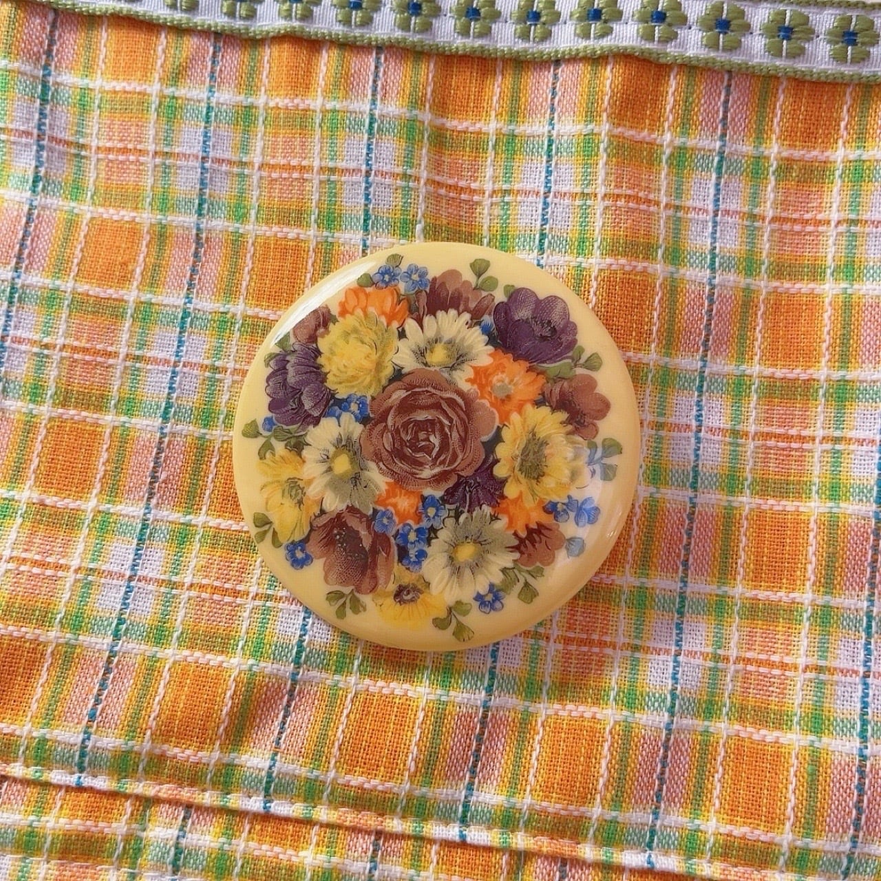 yellow floral round brooch