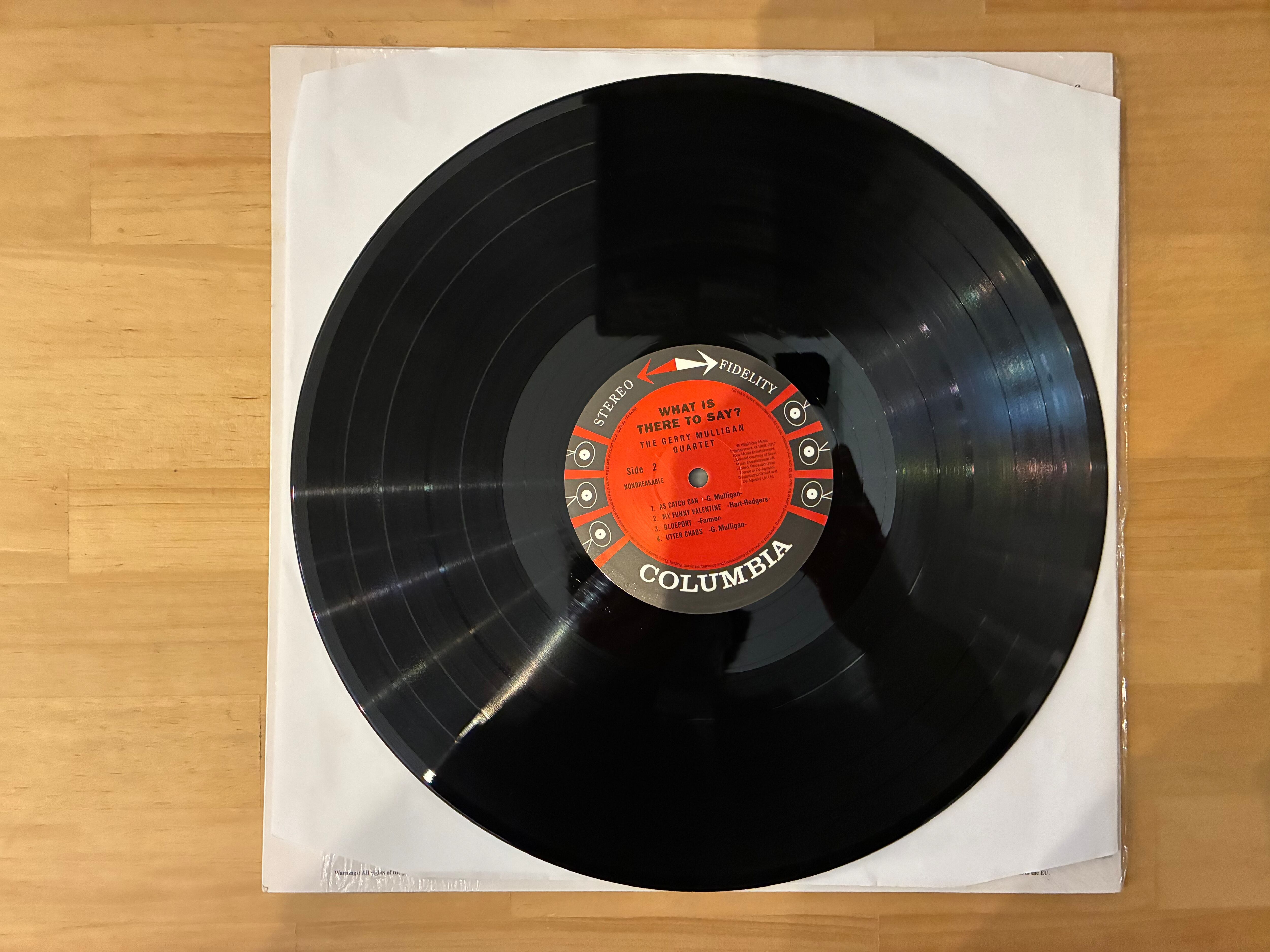 GERRY MULLIGAN / WHAT IS THERE TO SAY ? | sixteen records