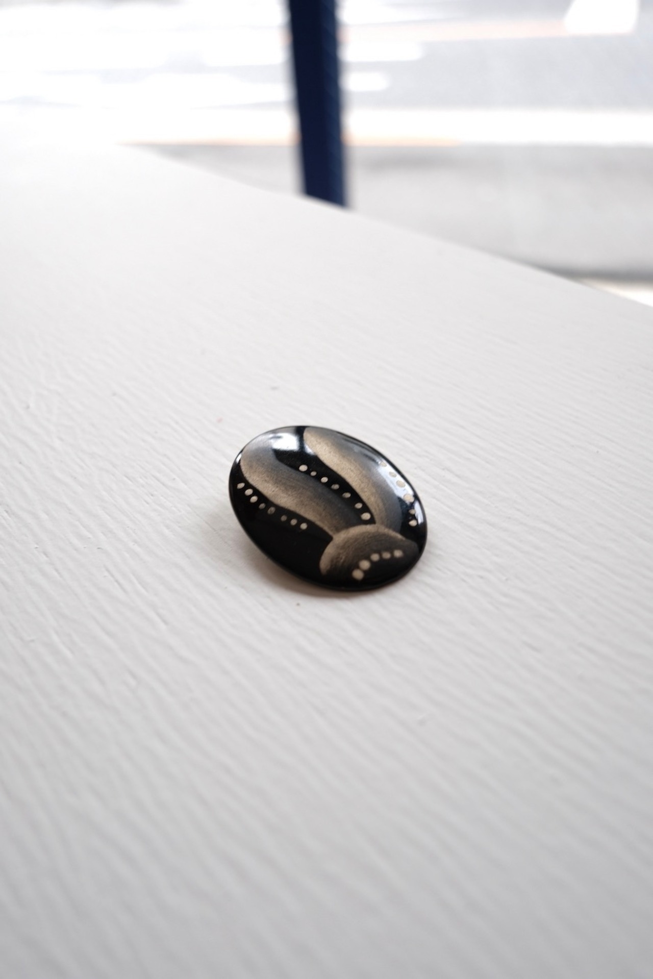 Hand-painted oval brooch