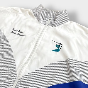 【adidas】90s トラックジャケット ジャンパー ブルゾン 刺繍ロゴ フルジップ バックプリント 切替 銀タグ 万国旗タグ アディダス US古着