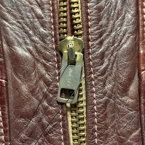 vintage 1970’s EAST WEST MUSICAL INSTRUMENTS leather jacket “SMOKE”