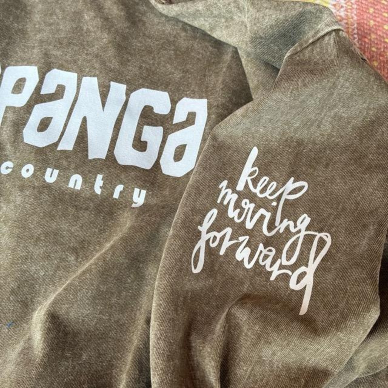 TOPANGA Lady's TOPANGA FIRECOUNTRY Pigment dyed T-shirt Magic is something you make Khaki 　ピグメントダイ長袖Tシャツ　マジックイズ　カーキ