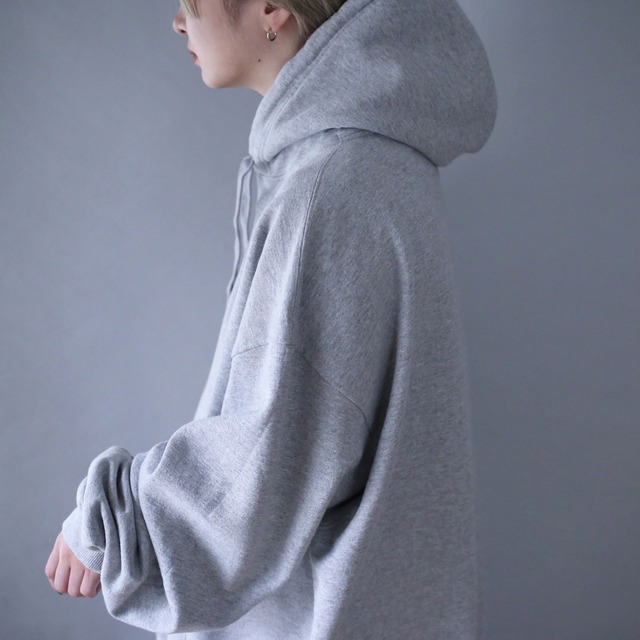 "Champion" light gray color over silhouette sweat parka