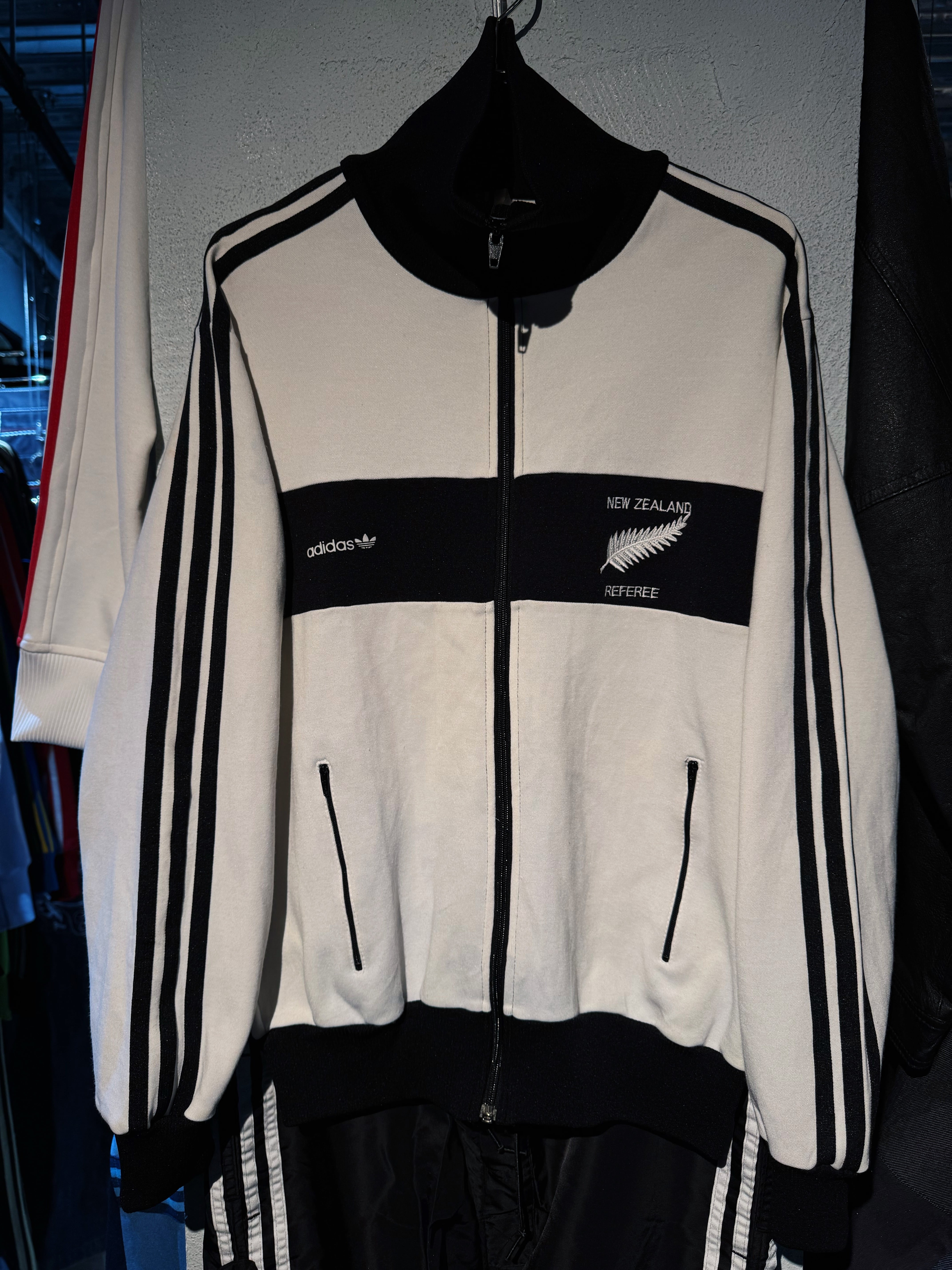 ”ADIDAS Originals”monotone color stand neck track jacket