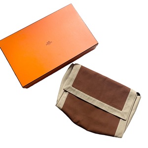 HERMES canvas clutch bag “Tapidocel”