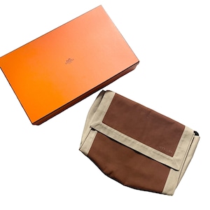 HERMES canvas clutch bag “Tapidocel”