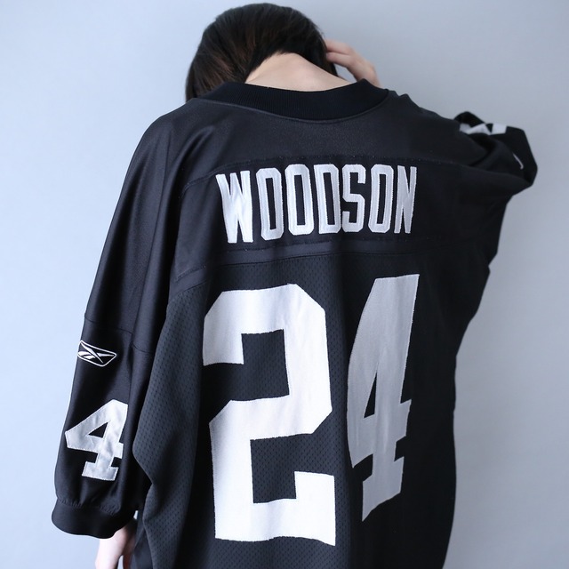 "Reebok×NFL" 24 numbering over silhouette black game shirt