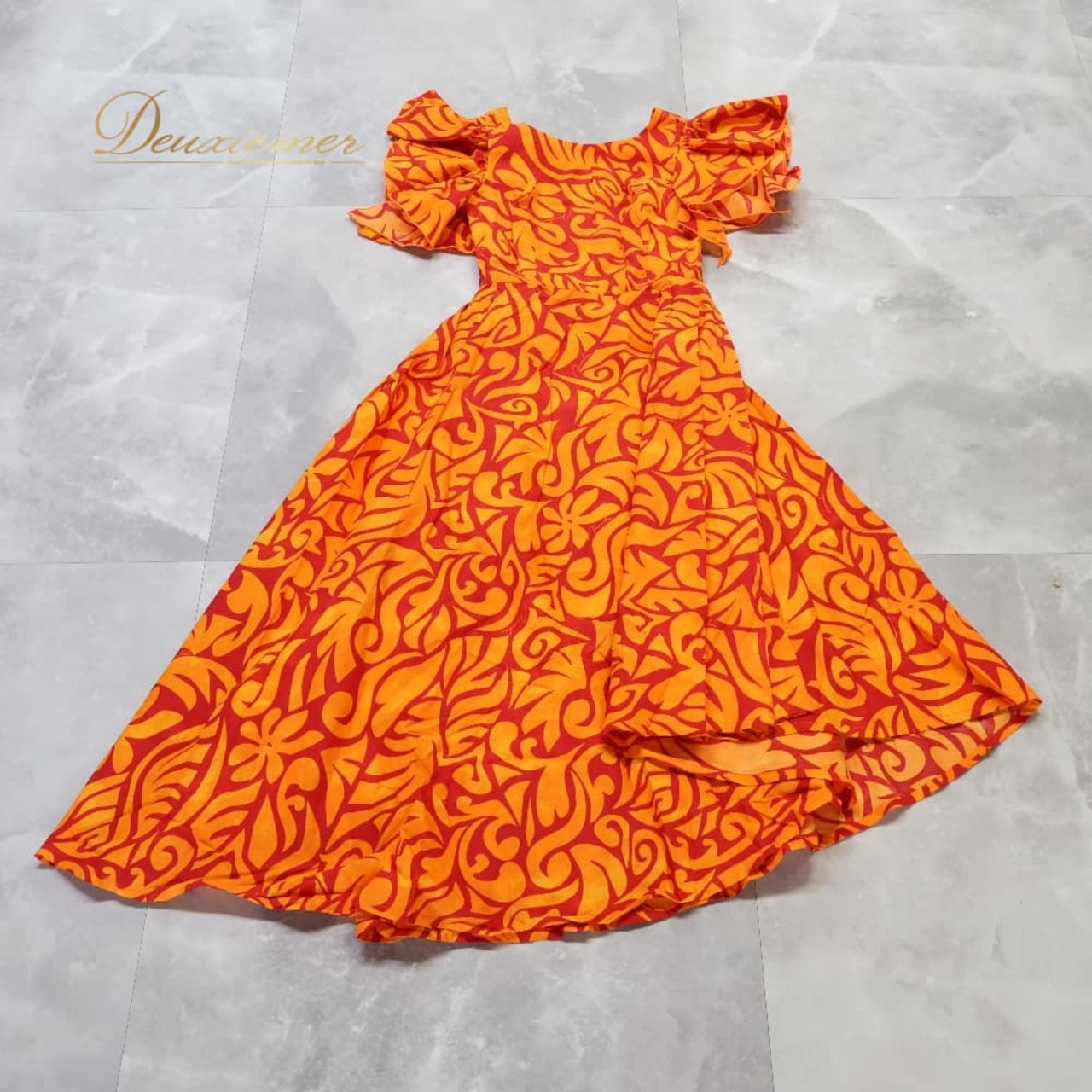 ハワイアンダンス 衣装 MermaidLine MMJ マーメイドライン エムエムジェイ ワンピース フラダンス オレンジ系 ドレス アシンメトリー 赤 ティアレ柄 花柄 華やか かわいい ダンス衣装 イベント ステージ ハワイアンプリント アロハ レッド系