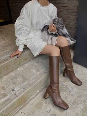 slanted cut heel long boots