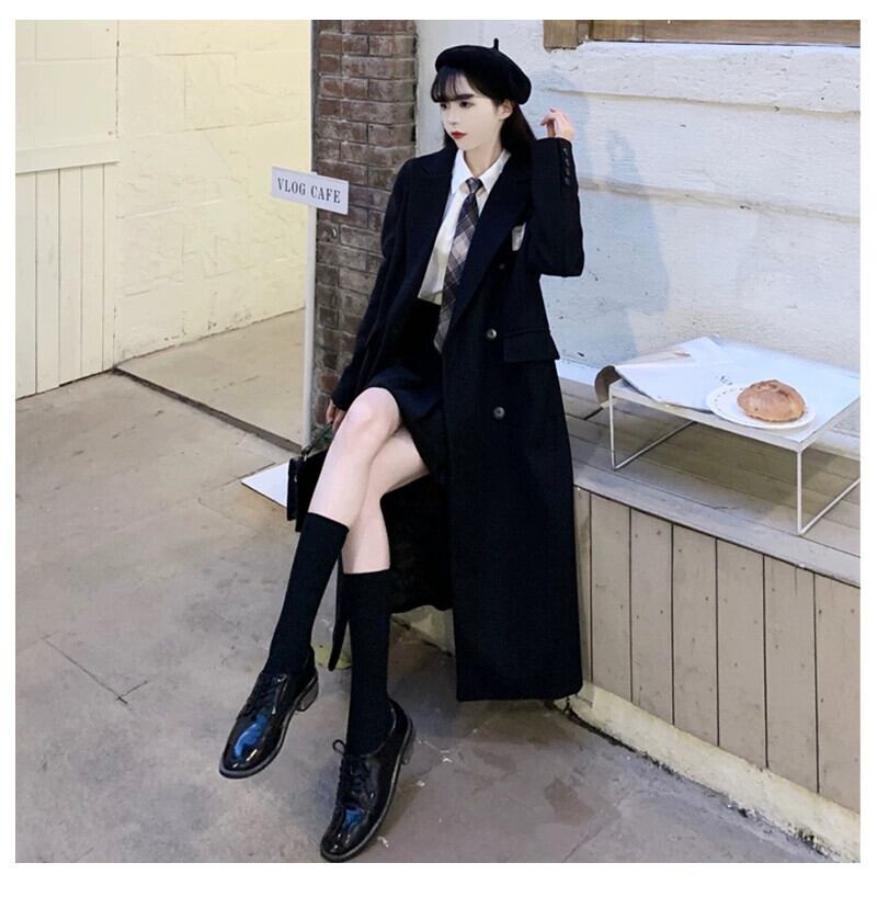 プラスサイズの女性の脂肪ミリメートル黒のウールのコートの女性