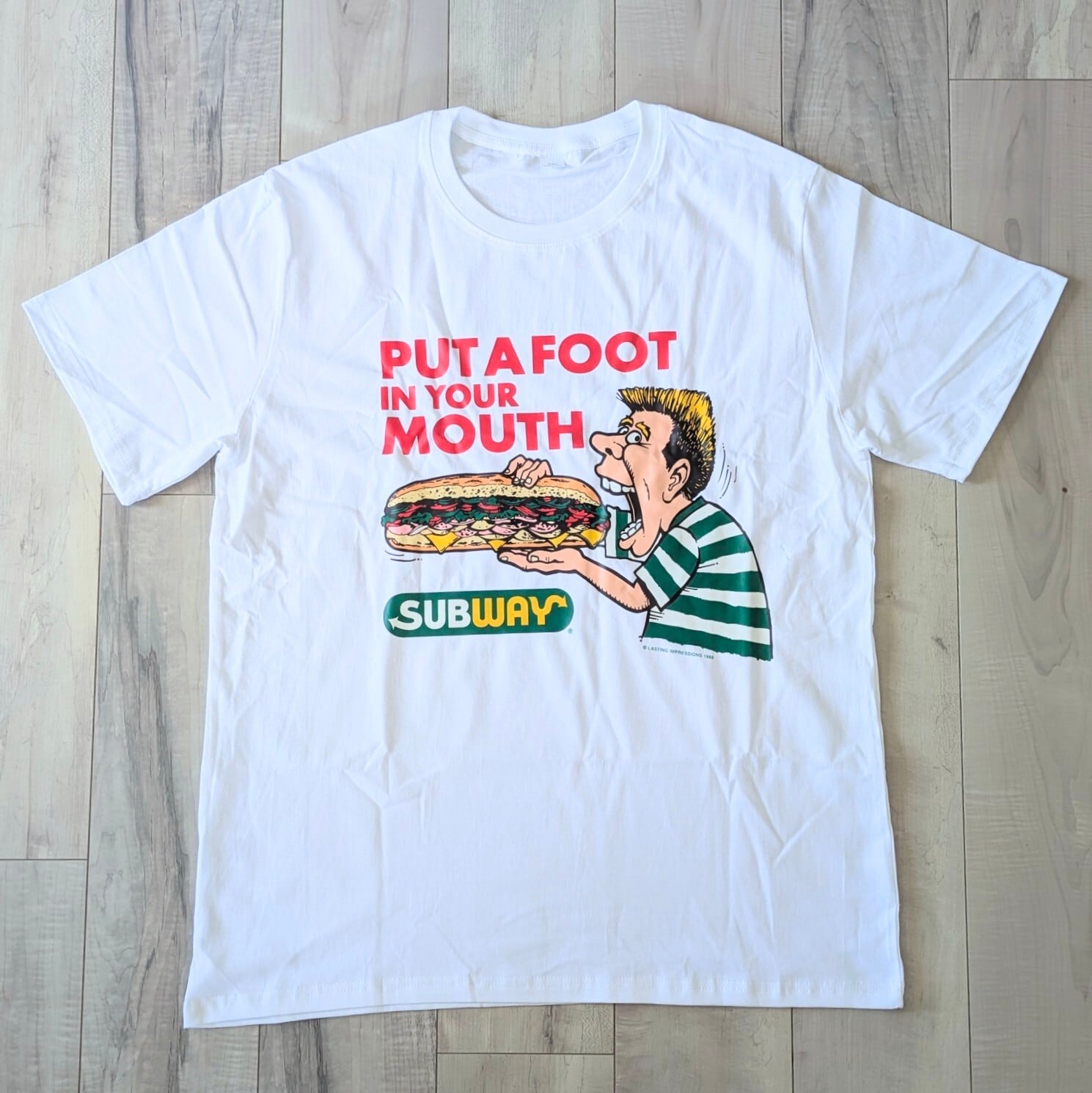 ♧【 SUBWAY ( サブウェイ )】『 PUT A FOOT IN YOUR MOUTH 』Tシャツ 〚アメリカン雑貨 アメトイ〛
