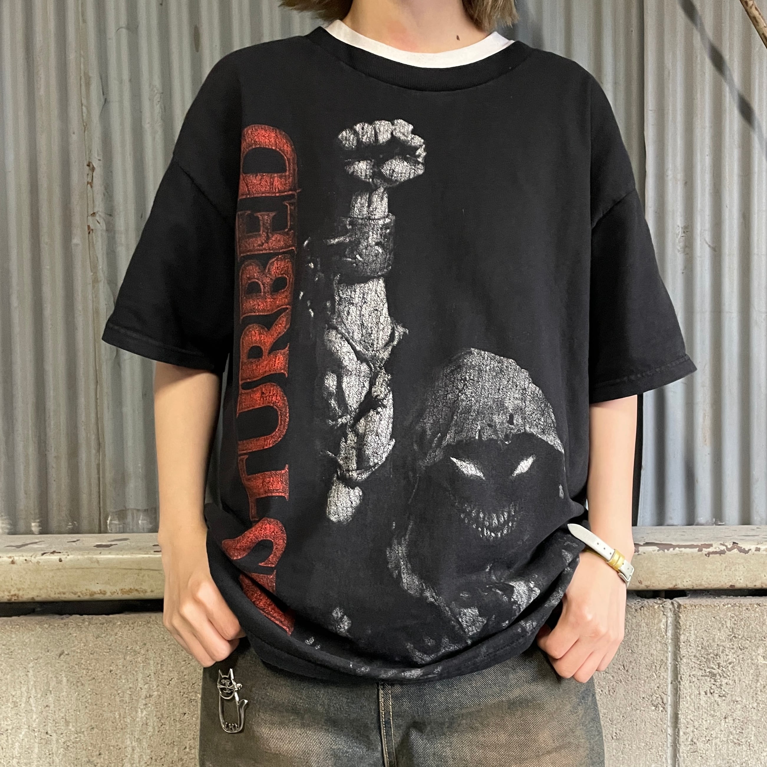 DISTURBED ヘヴィメタル バンドTシャツ プリントTシャツ メンズL相当 古着 ブラック  黒【Tシャツ】【AN20】【PS2307T】【SS2308-3】 | cave 古着屋【公式】古着通販サイト powered by BASE