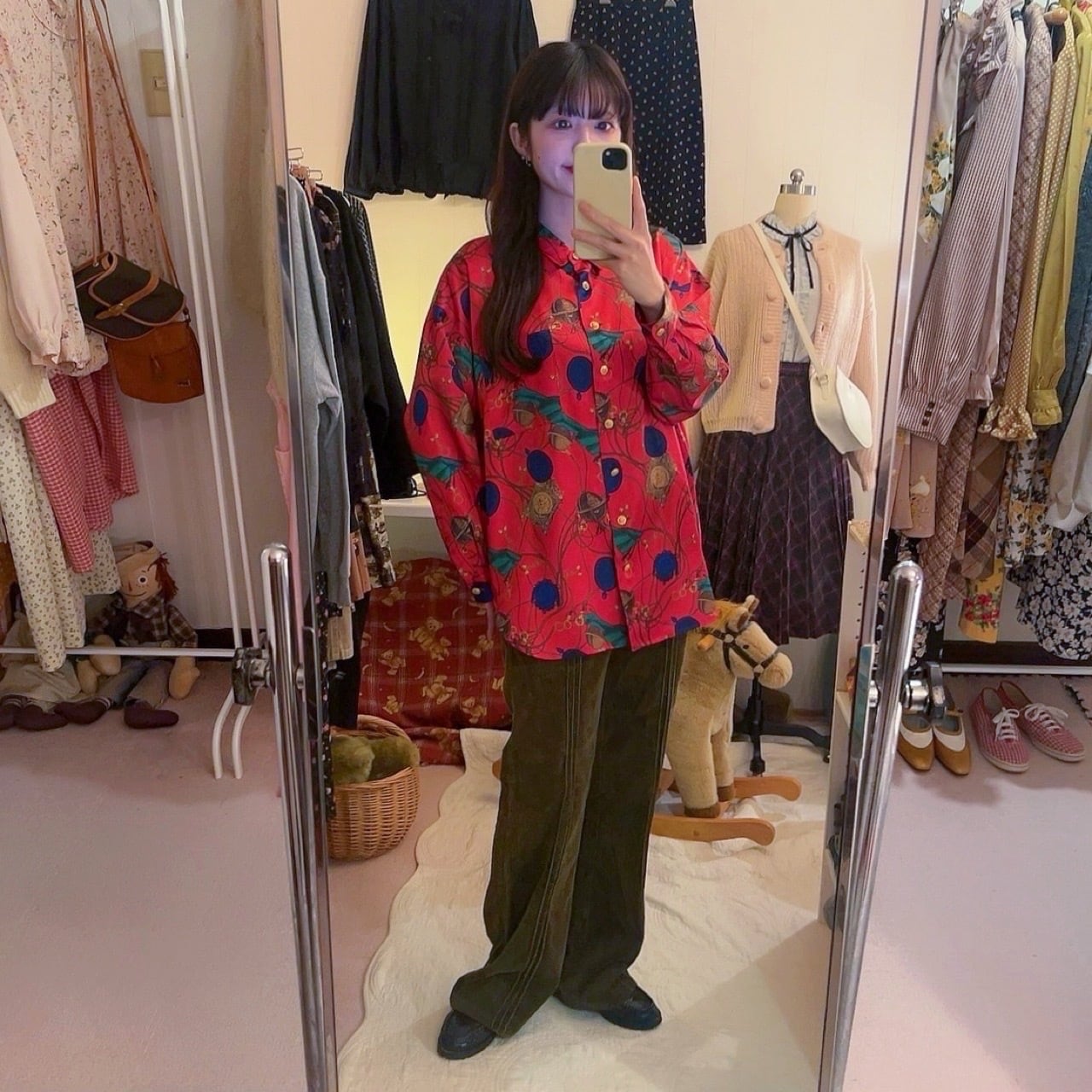 clock and globe red satin blouse