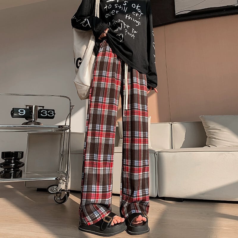 レトロな緑のチェック柄のズボンの女性、春と秋、アメリカン スタイル