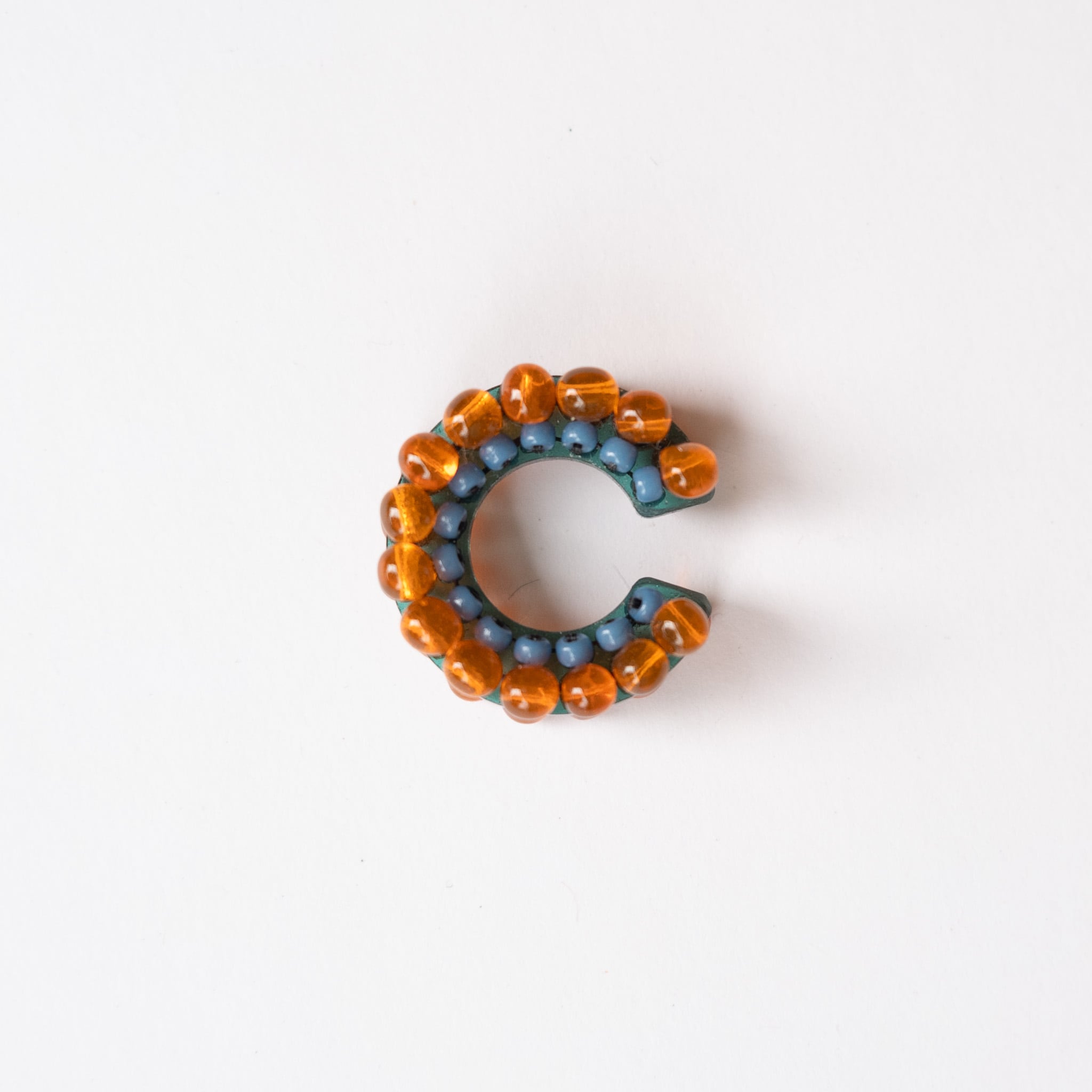 puzzle ring ear cuff [35]