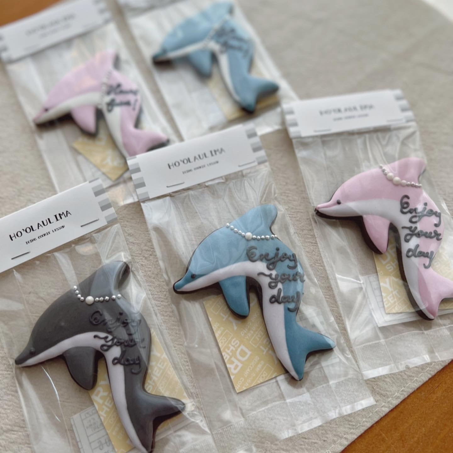 コップの縁掛けイルカクッキー