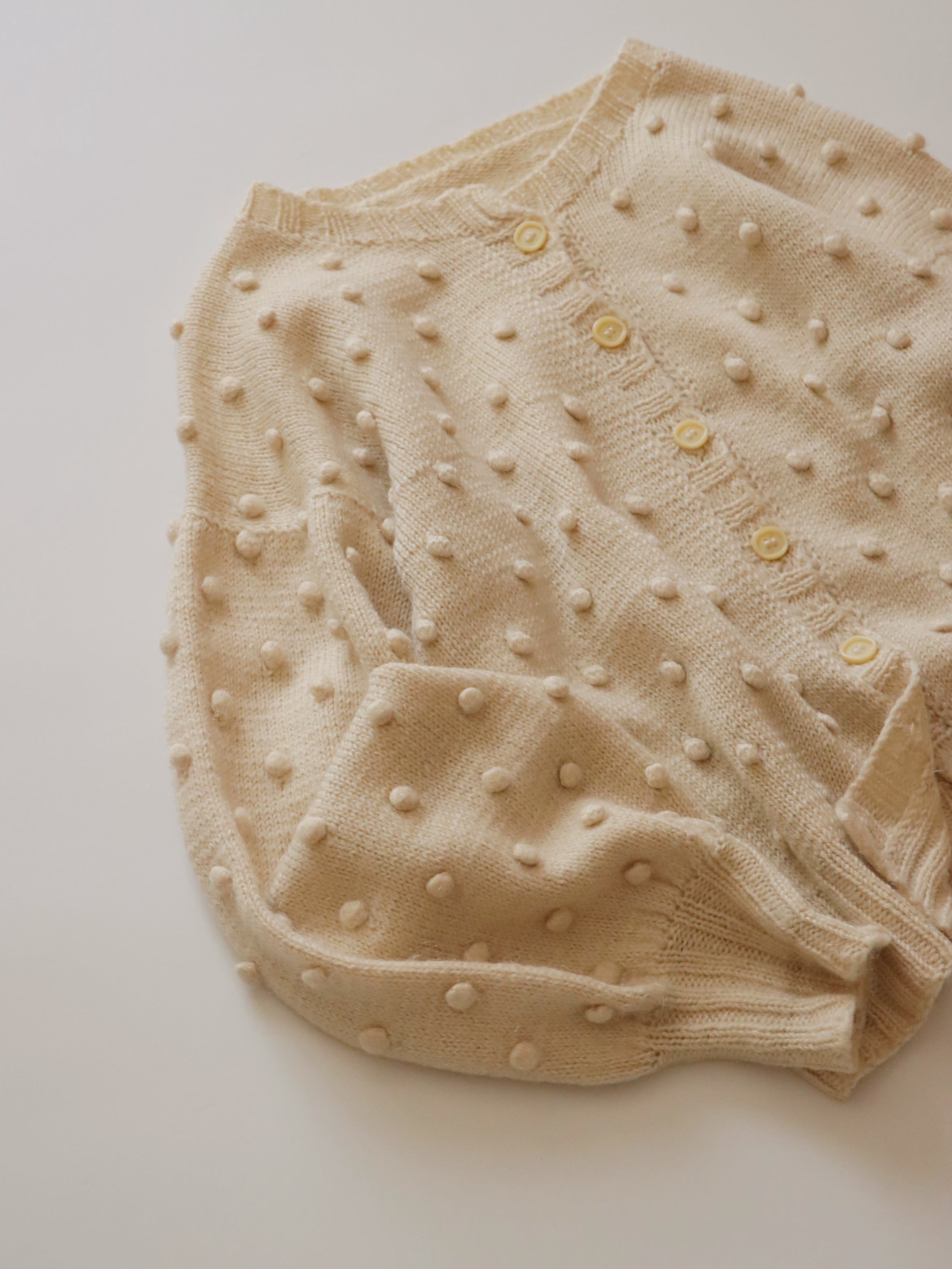 ●pompom knitted design balloon sleeve cardigan