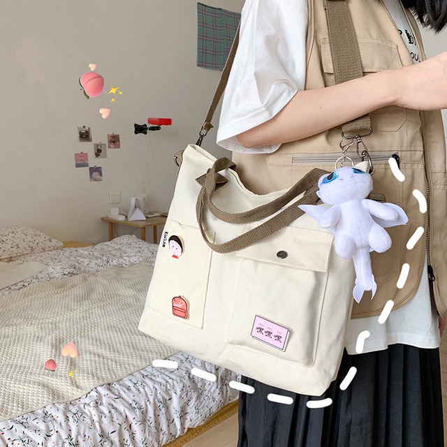 大容量バッグ女性バッグ2020新しい波夏のファッションカジュアルキャンバスメッセンジャーバッグワイルドワイルドトートバッグ Tiancai_Wing_Bag4106612