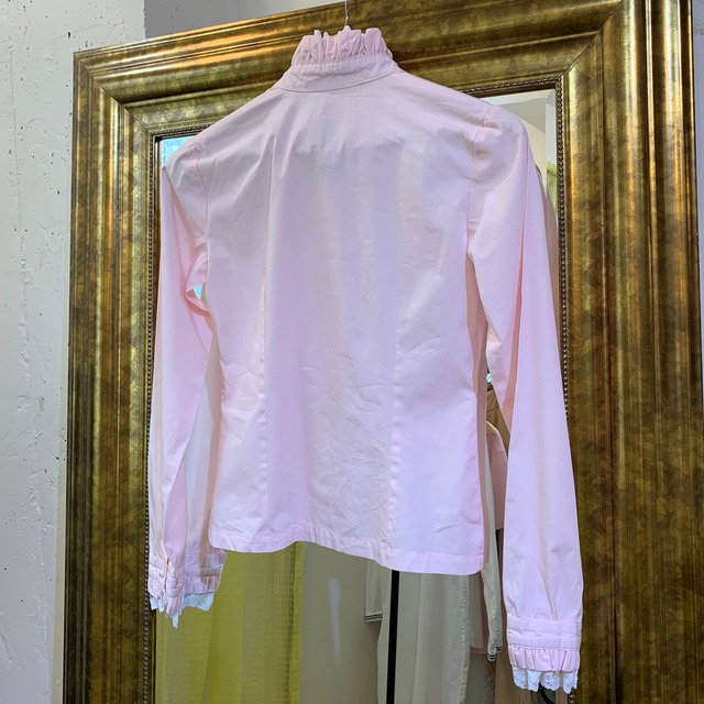 pink frill blouse with pearl buttons