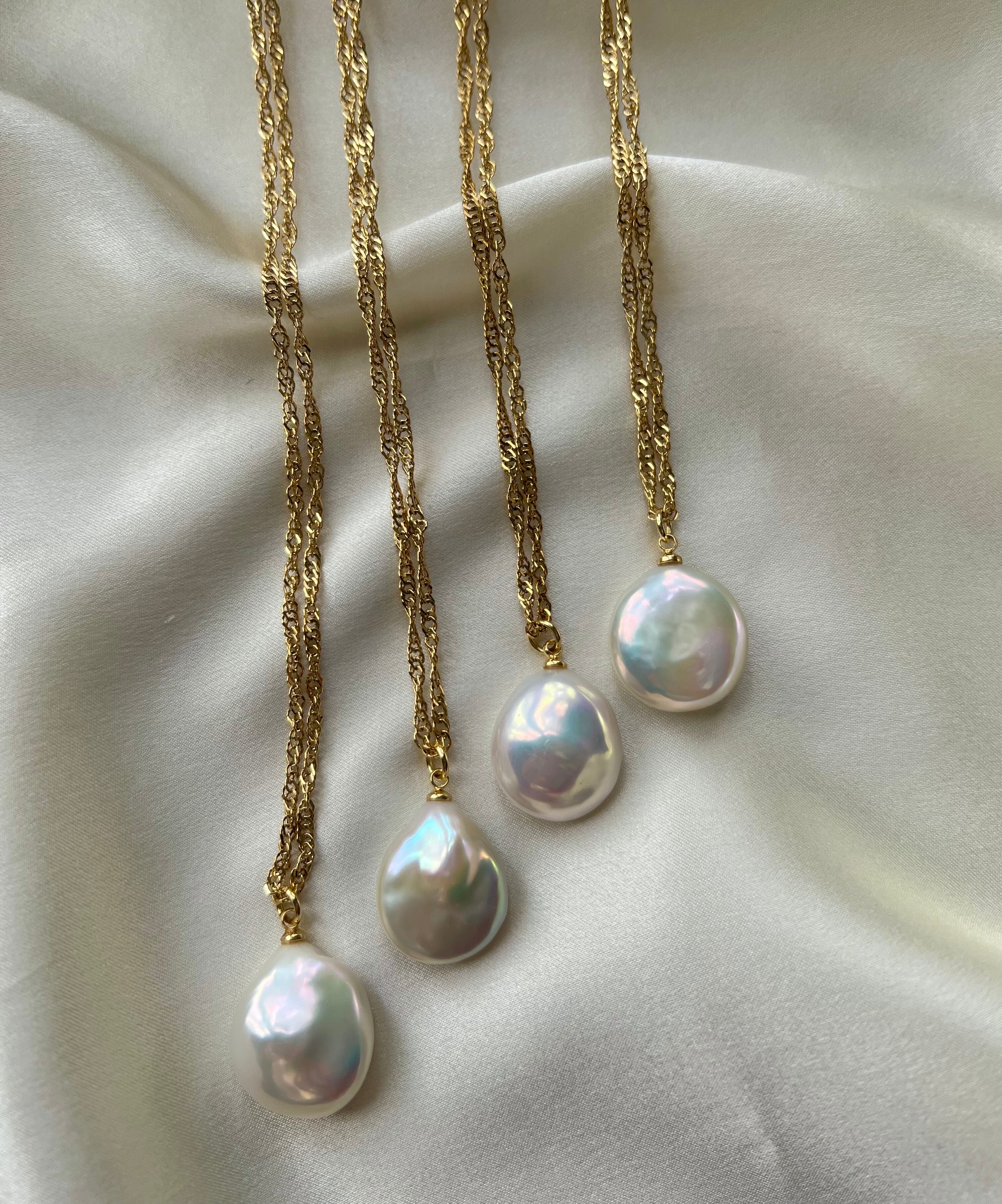 puff pearl long necklace / ネックレス バロックパール | yuma