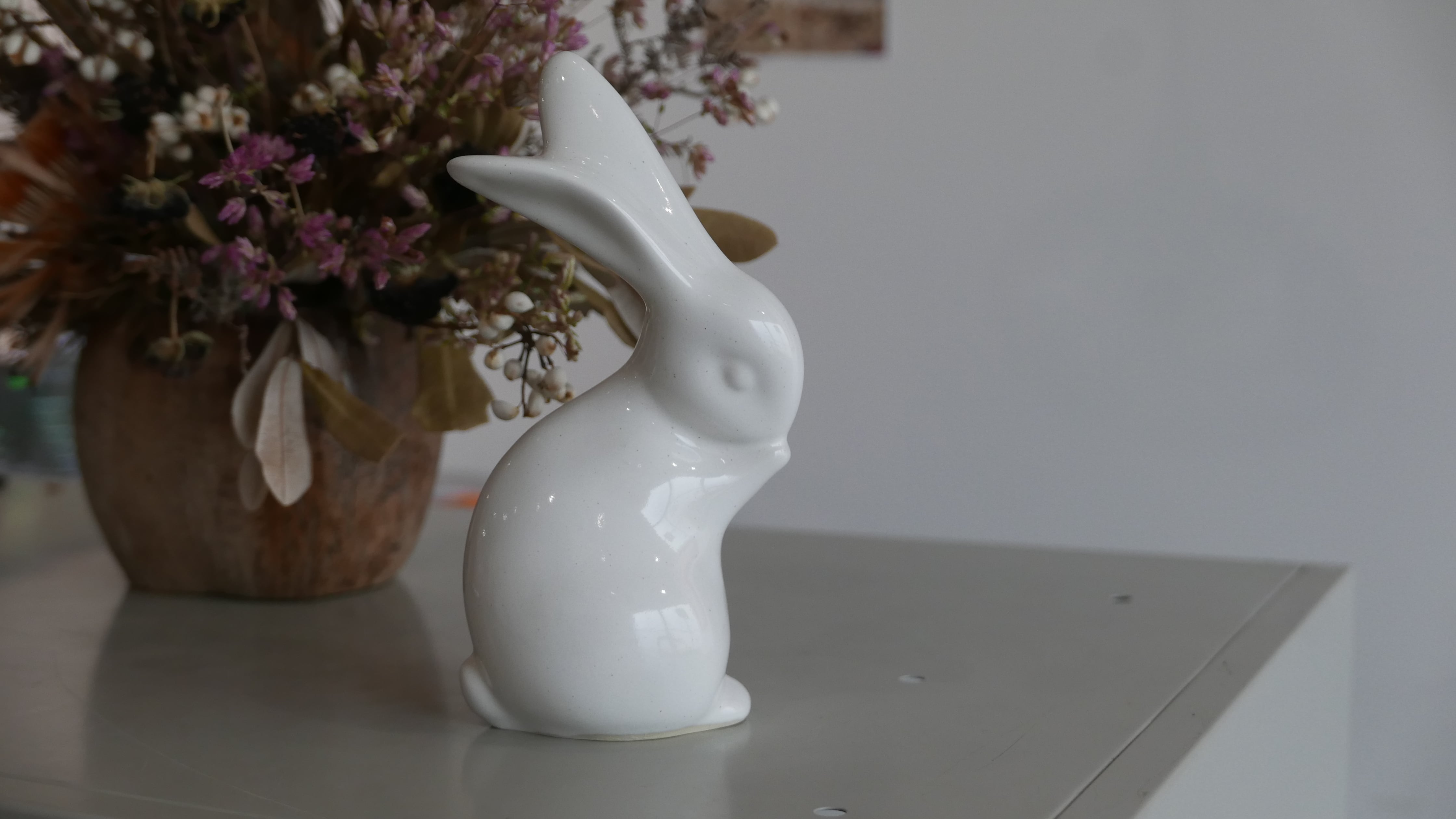 old pottery rabbit , melange white