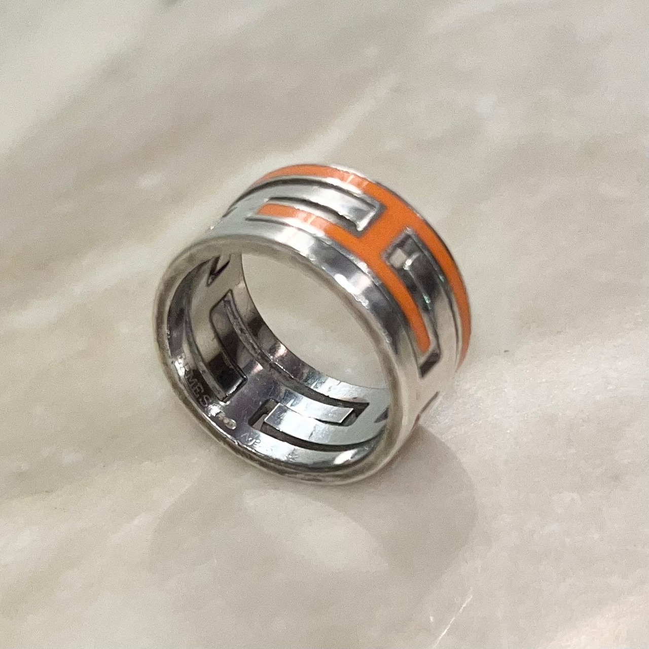 HERMES silver “Move H” ring Orange