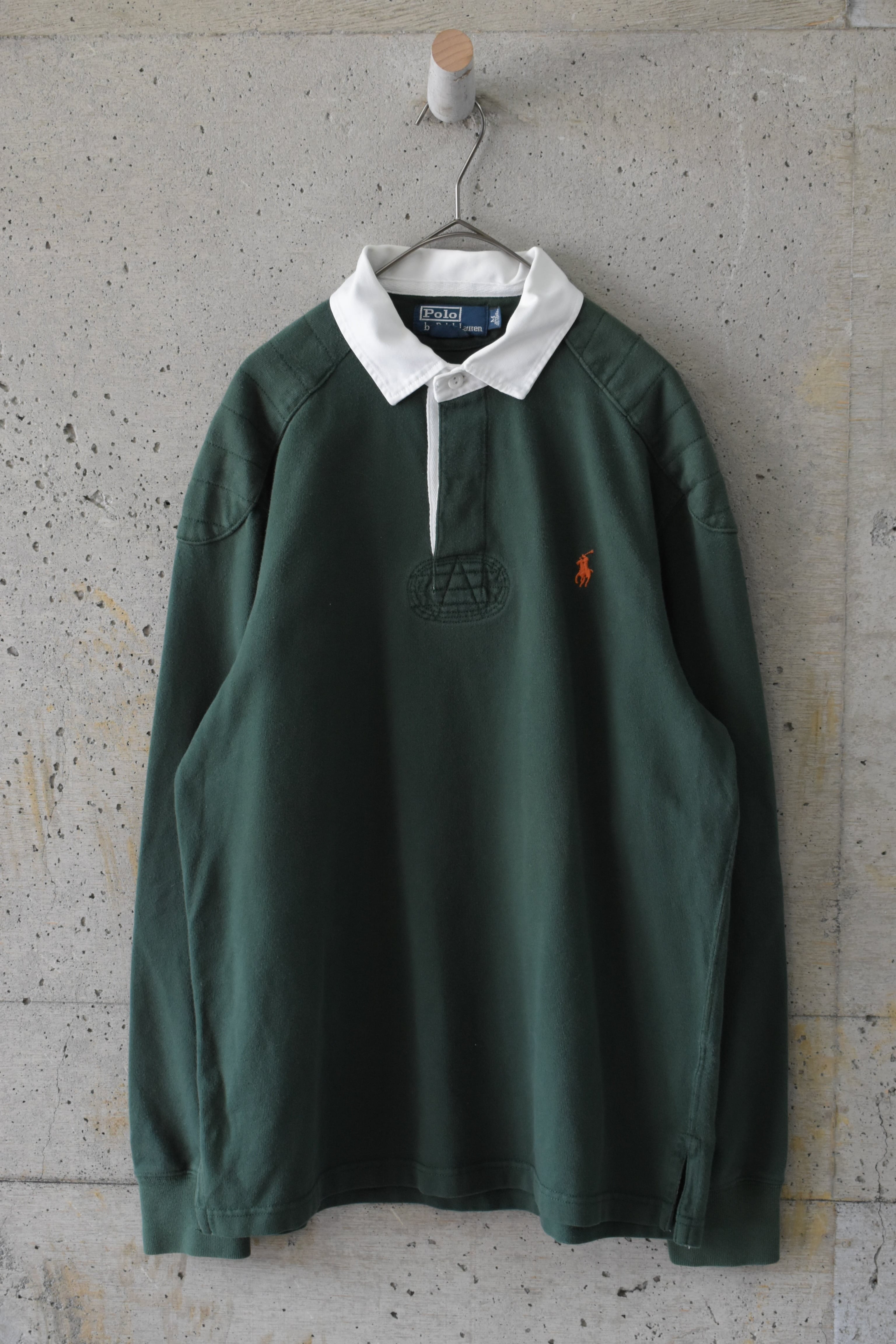 Green rugby shirt with elbow and shoulder patches