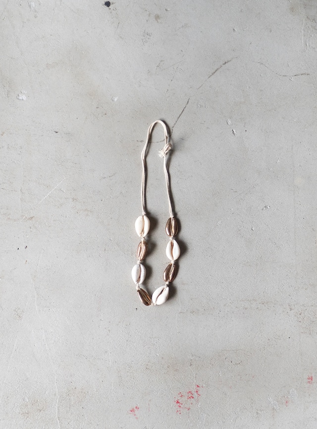 unknown used Cowrie and brass necklace