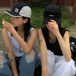 [AAKE] COZY YOGURT SLEEVELESS (white / black) 正規品 韓国ブランド 韓国通販 韓国代行 韓国ファッション トップス