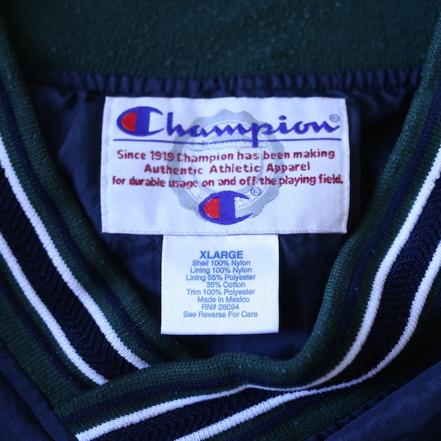 "Champion" front logo design over silhouette nylon pullover