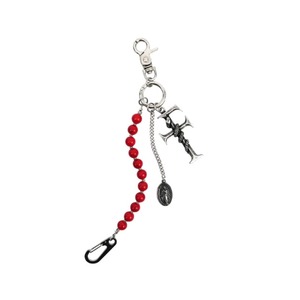 FAR FROM WHAT/ charm keyring red