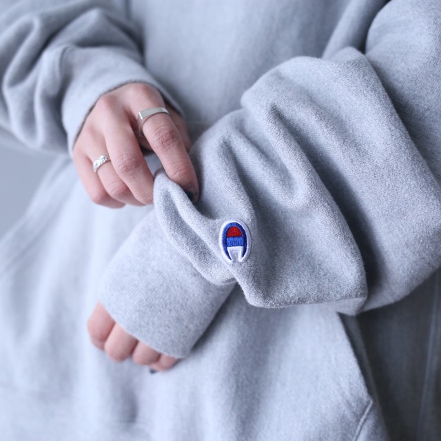 "Champion" front logo design over silhouette reverse wave sweat parka