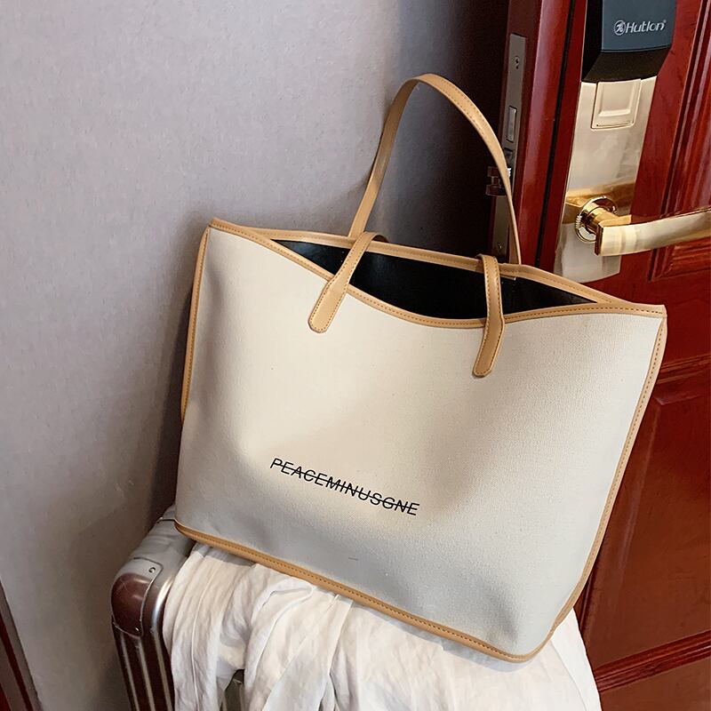 大容量のバッグレディースバッグ2020夏の新しい波シンプルシンプルワイルドショルダーバッグカジュアルキャンバストートバッグ Tiancai_Wing_Bag8682165